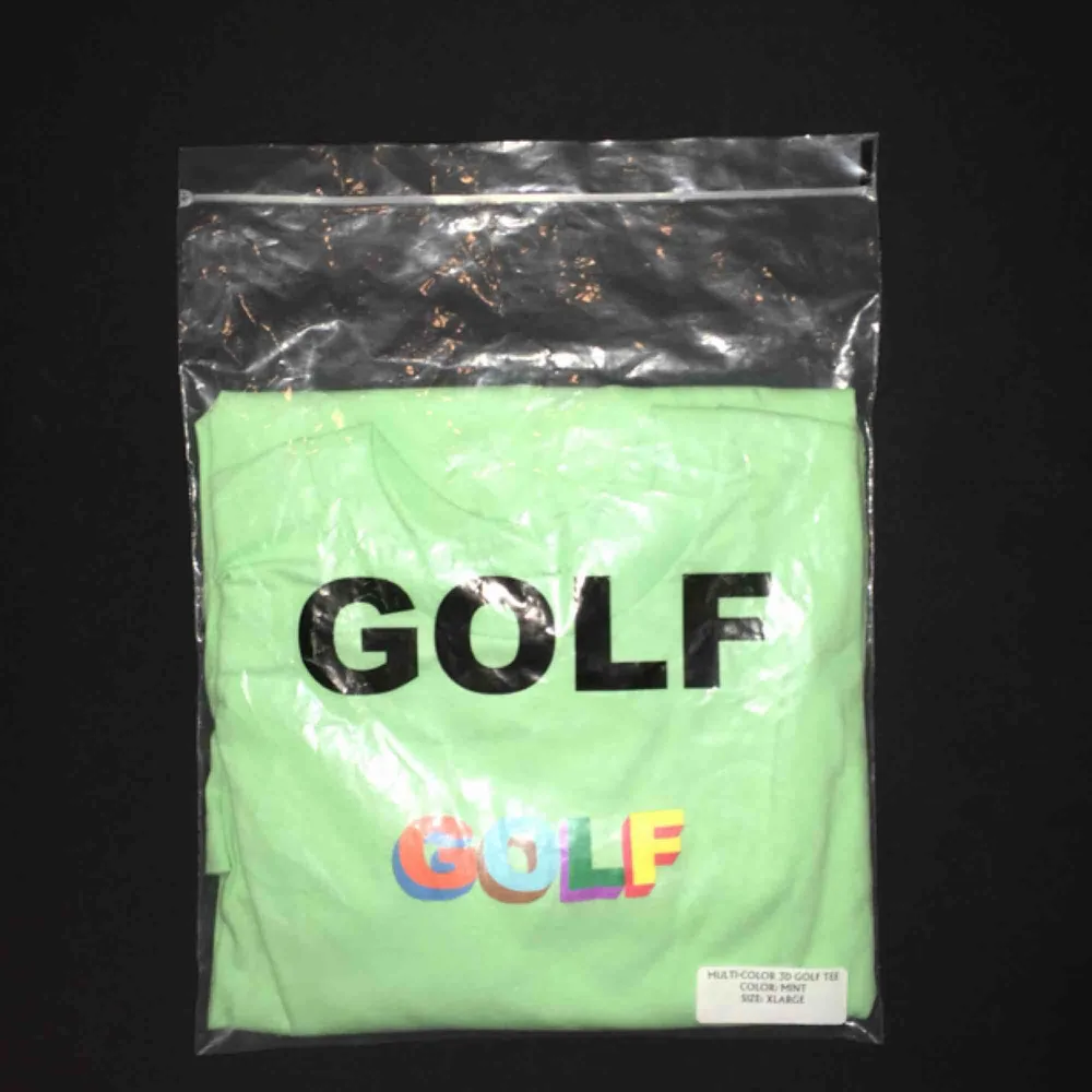 Grön golf wang 3D tee, aldrig använd.. T-shirts.