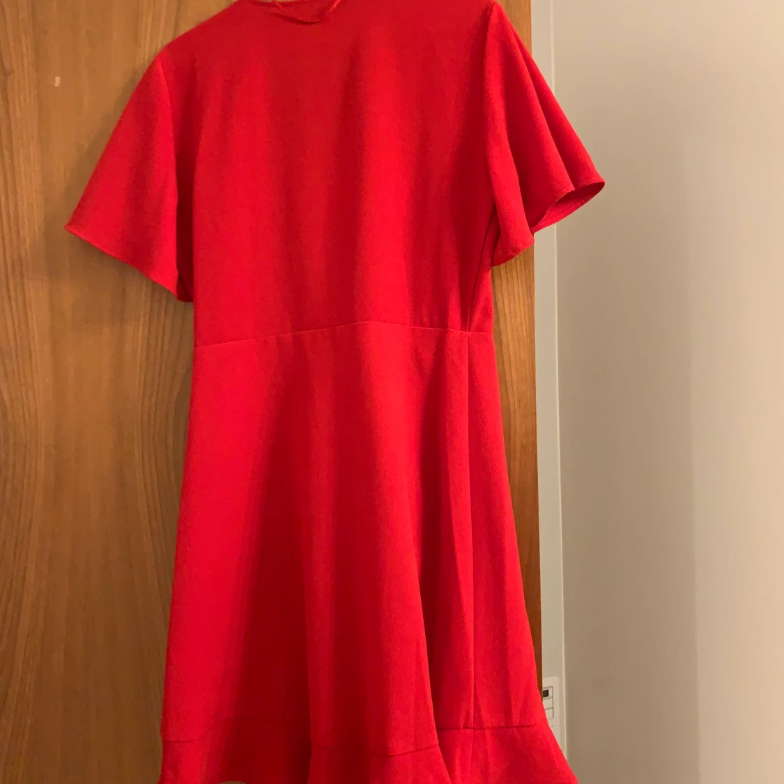 Röd omlottklänning oanvänd  - 90