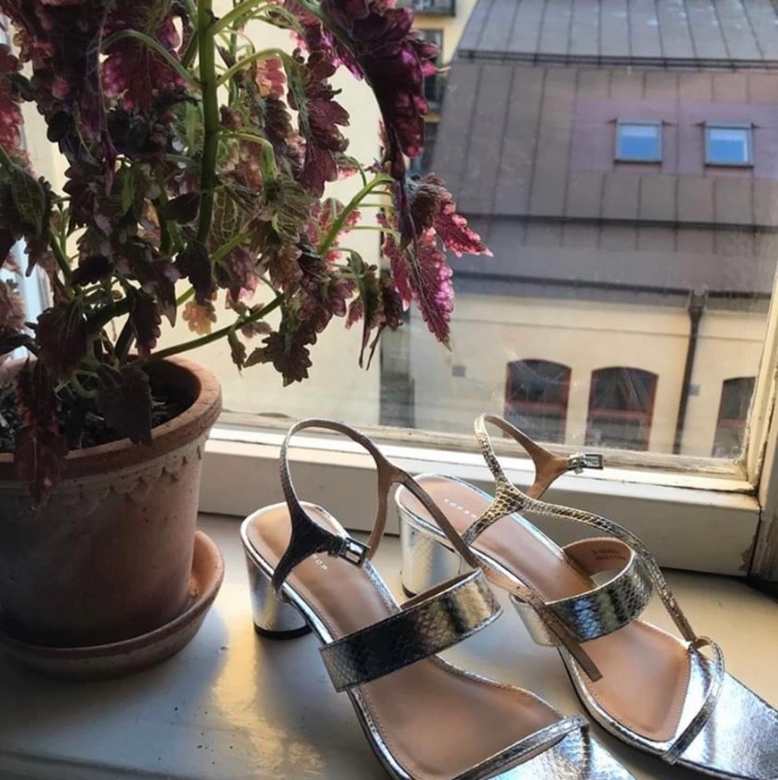 Klackade sandaler i silver