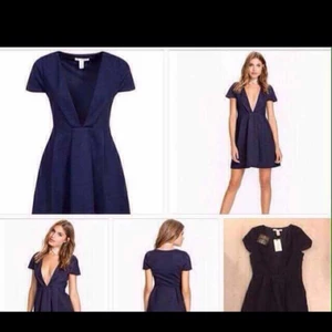  - Snygg marinblå klänning från Nelly aldrig använd lapparna kvar strl S