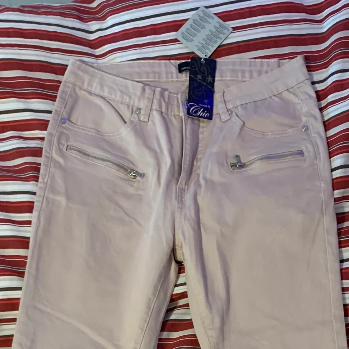 Ljusrosa byxor  - 90