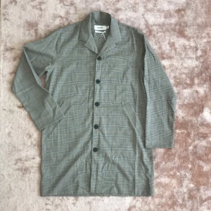  - Tunn kappa/lång kavaj  Herr storlek 39-40 (M) 