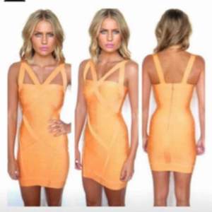 Den perfekta partyklänningen! Orange bandage klänning strl 8