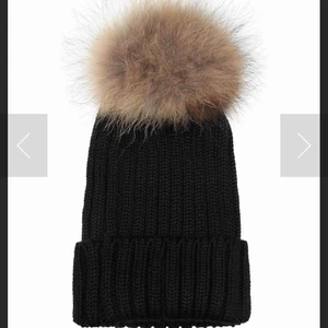  - Säljer en hollies mössa i fint skick. Äkta päls