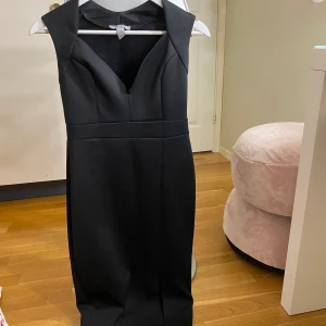 Klänning - Storlek M passar en S