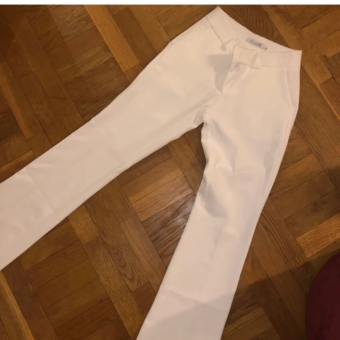 Vita kostymbyxor - 91