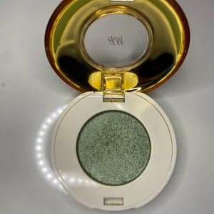 Smink, ögonskugga  - Oanvänd grön, glittrig ögonskugga från hm.