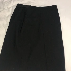 Kjol - Svart kjol. Storlek 34. ANVÄND EN GÅNG