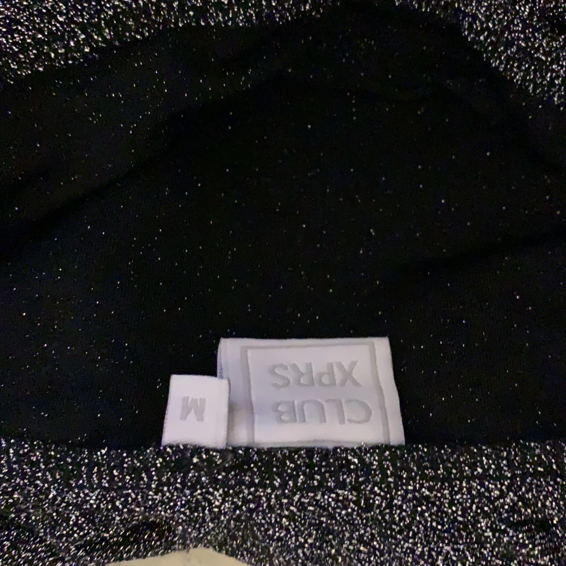 En blus svart o silvrig  - 91