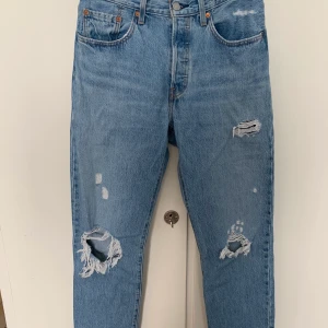 Levi’s 501 - Fint skick, klassisk jeansfärg Storlek w27L28 
