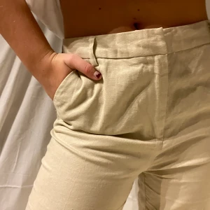 Linnebyxor - Linnebyxor i strl 38, använda en gång