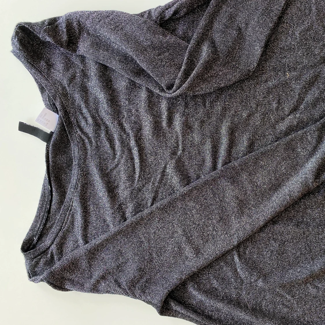 Glittrig långärmad 