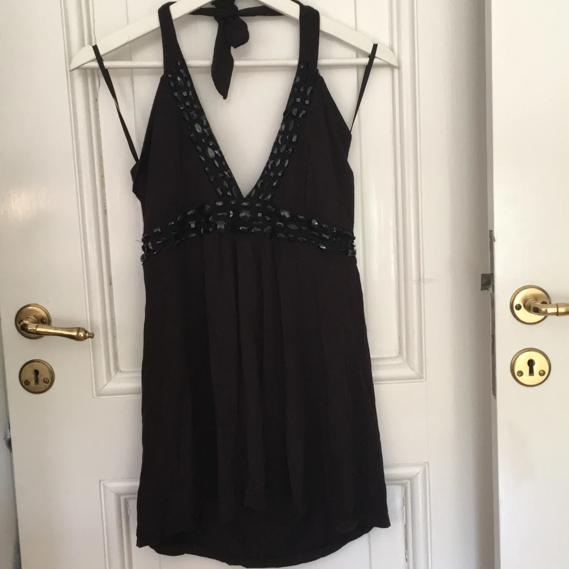 Festlig topp med pärlor