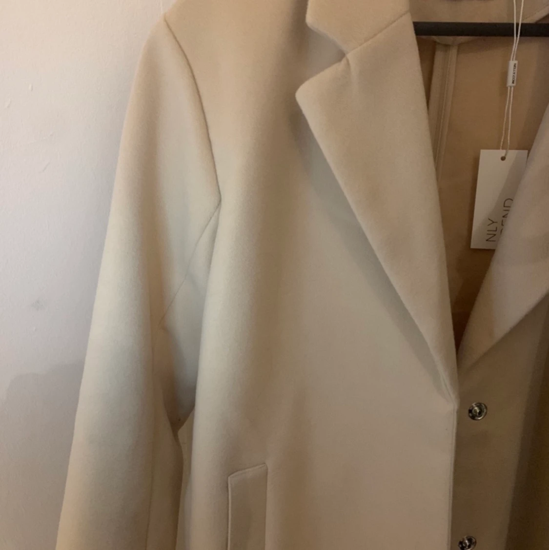 Oversized kappa från Nelly - 90