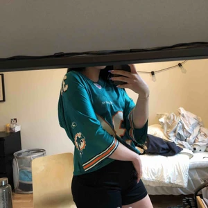  - äkta NFL dolphins jersey (amerikansk fotboll) med R.WILLIAMS namn bak. 