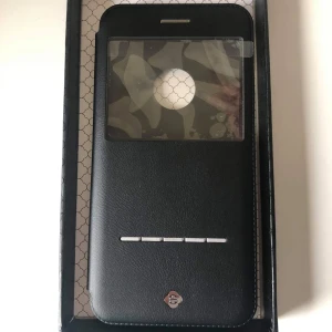 Mobilplånbok för iPhone 6plus - TOTUDESIGN mobilplånbok för iphone 6plus. - Perfekt kvalitet. - Oanvänd! 100% nytt. Hämta i Storskogstorget, Näckrosen T-bana, Sthlm eller frakt 25kr.