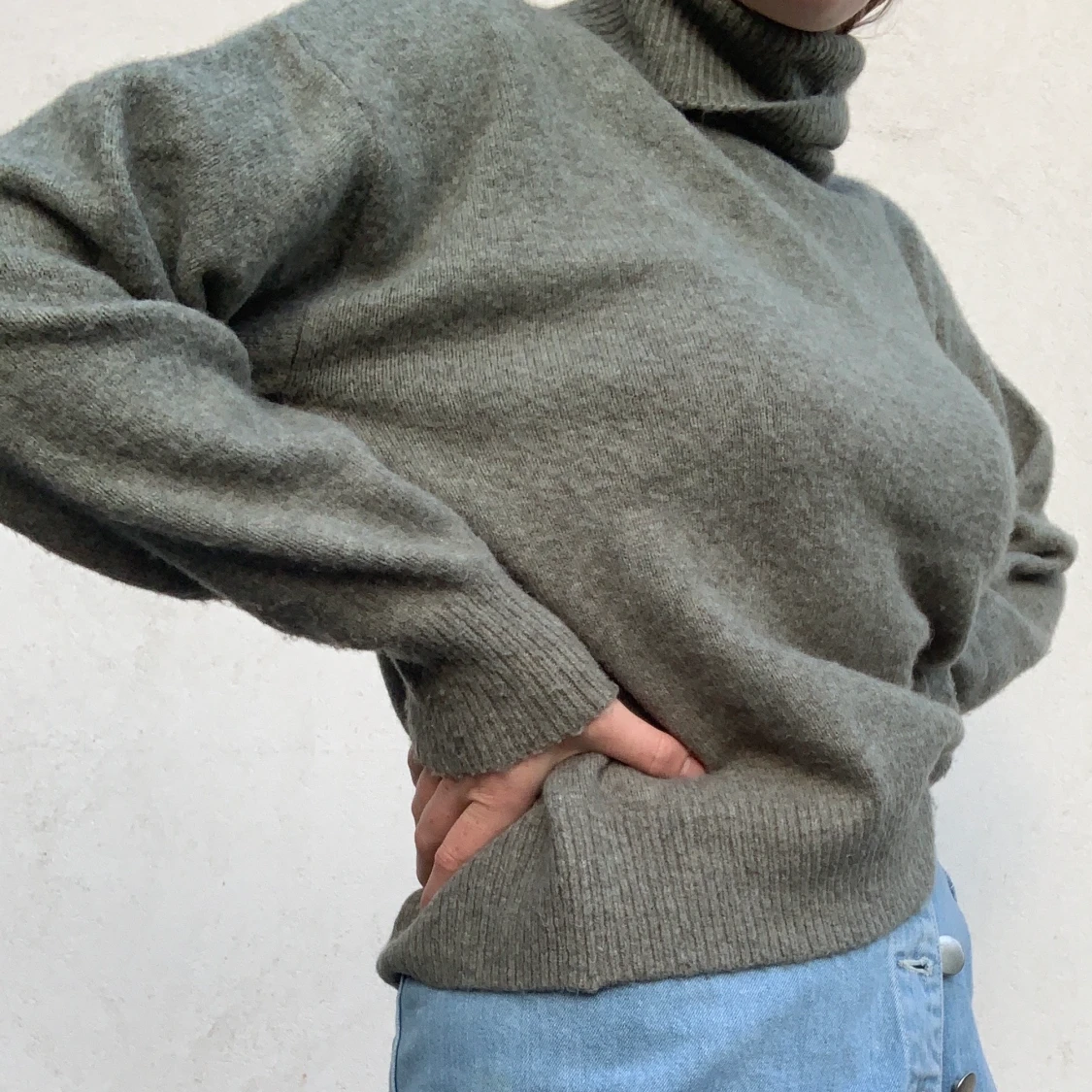 En stickad grön tröja - 91