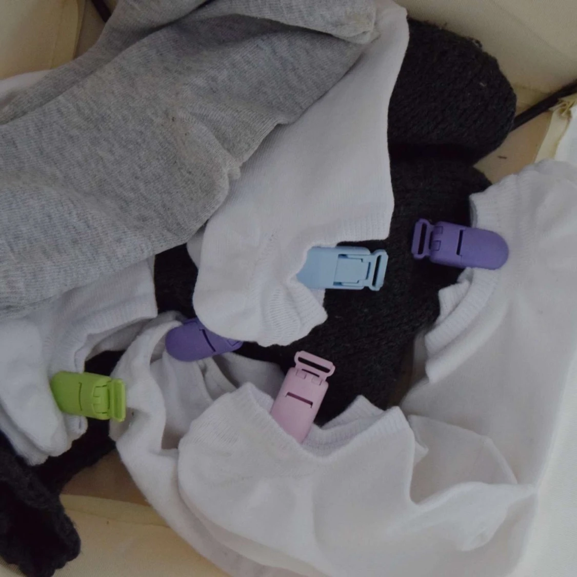 Flerpack, 4 färger, 10 klämmor i varje färg - 91