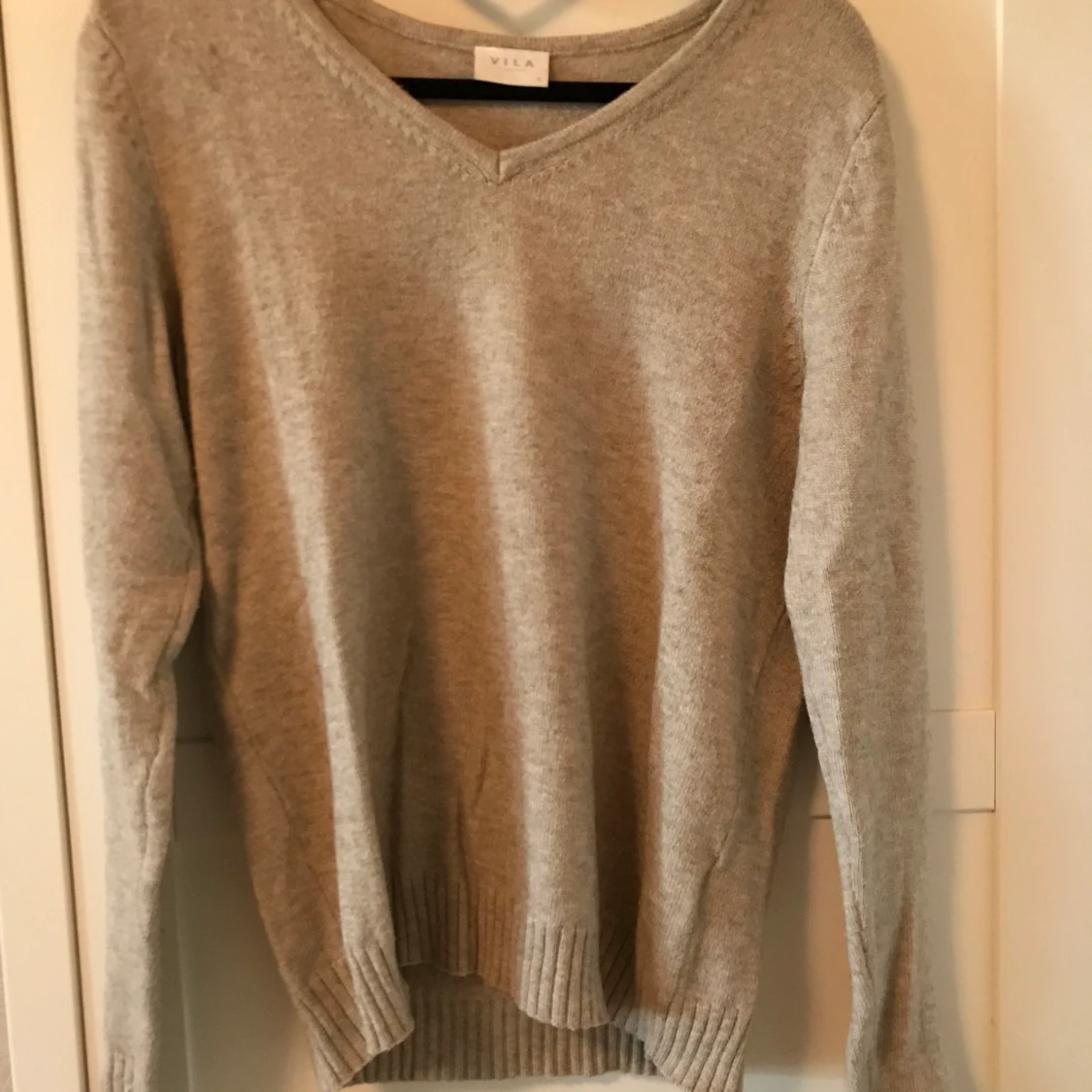 Beige stickad från vila 