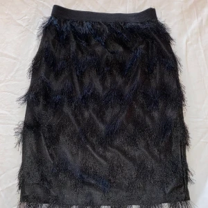 Kjol - Svart kjol med fransar