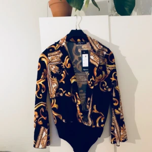  - Fin body. Aldrig använd förutom på bilden. Prislapp kvar!