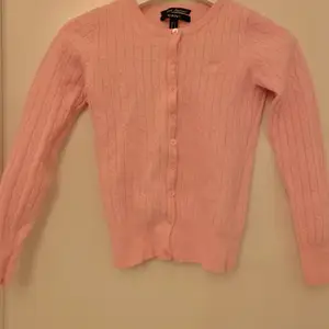 Rosa gant tröja ,som är alldelses för liten för mig .Storlek XS💕