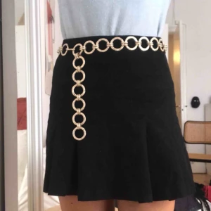  - Justerbart chain belt