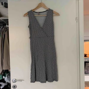  - Omlottklänning. Priset är inklusive frakt.