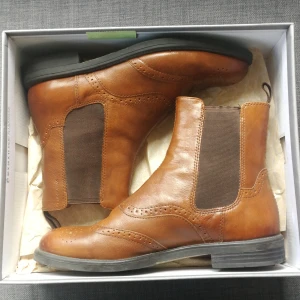 Vagabond leather boots - Worn only once, I got them on sale at Vagabond but not my style anymore. Very sturdy and comfortable. Leather. 