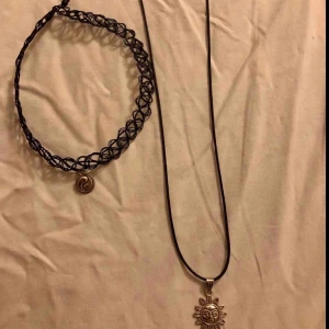Choker och halaband - Snygg svart sol halsband och choker.   Möts upp eller fraktar 