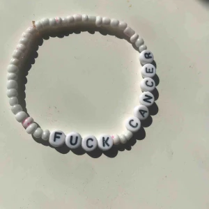  - Fuck cancer armband. Frakt 10 kr
