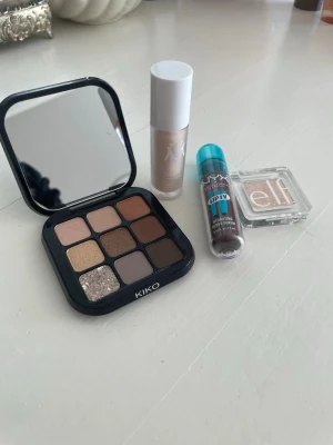 KIKO ögonskuggspalett  - 1. Kiko Milano palette 2. Make the make concealer i färgen N 1,5 3. Nyx lip stain 4. Elf vit glittrig ögonskugga. Säljer allt för 90 kr (har testat concealern och lip stain, men endast 2 gånger och ögonskuggorna är oanvända 🌸