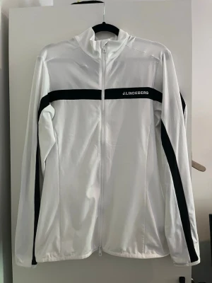 J Lindeberg jacka  - Säljer en mid layer jacka i fint skick från j lindeberg.