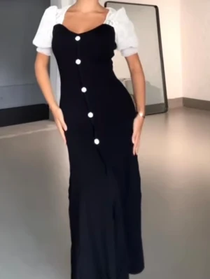 Midi/maxiklänning - Superfin elegant klänning från PALMA PARIS. Använd endast två gånger. 
