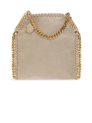 Handväska från Stella McCartney  - Supersnygg handväska från Stella McCartney i minsta storleken. Bra skick förutom några fläckar vilket man kan se på bilderna. Den är beige med guldig kedja