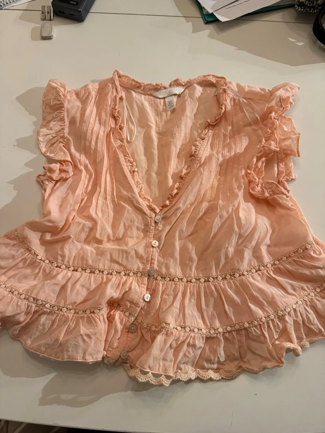 Persikofärgad blus med volanger H&M