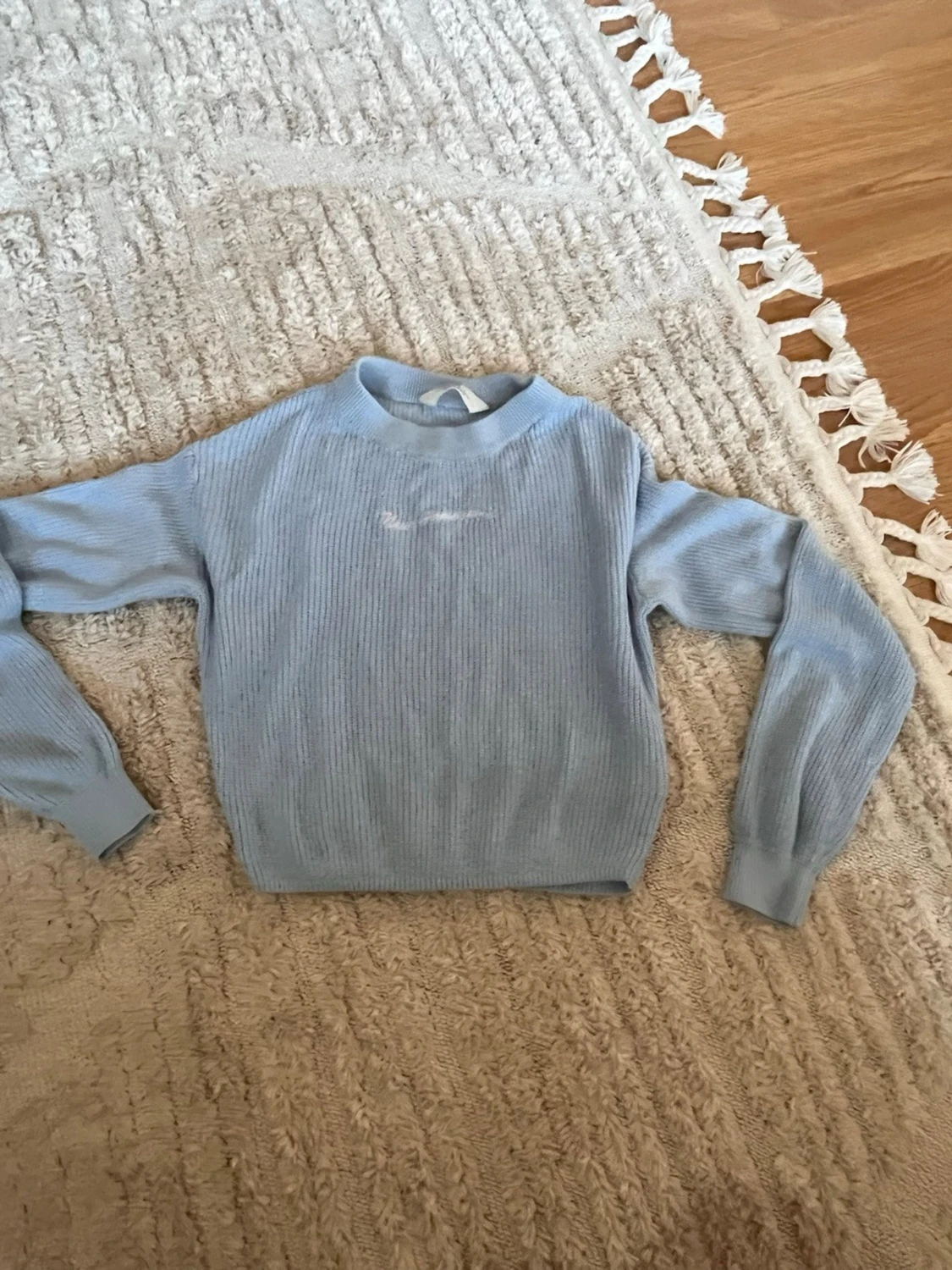 Stickad ljus blå tröja från H&M 