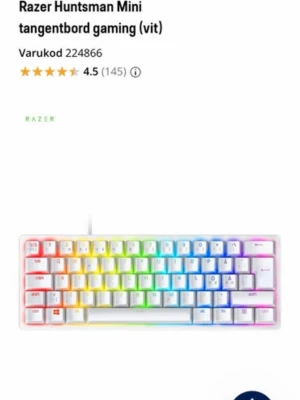 Razer Huntsman Mini gaming tangentbord - Säljer ett kompakt och stilrent vitt Razer Huntsman Mini gaming tangentbord med mekaniska switchar och RGB-belysning. Tangentbordet har USB-anslutning och är perfekt för gaming och snabba reaktioner. Materialet är plast och designen är modern och minimalistisk.