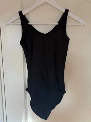 Svart dans/gymnastik/tränings body 🖤 - Body för dans, gymnastik eller träning 🖤 skulle säga att den är mer åt XS hållet. 