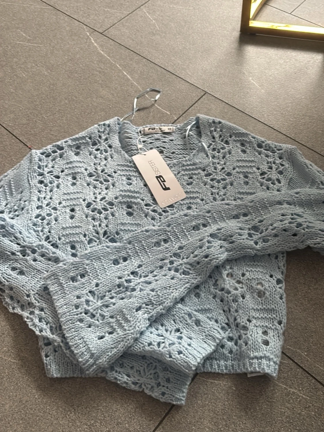 Ljusblå virkad tröja FB Sister