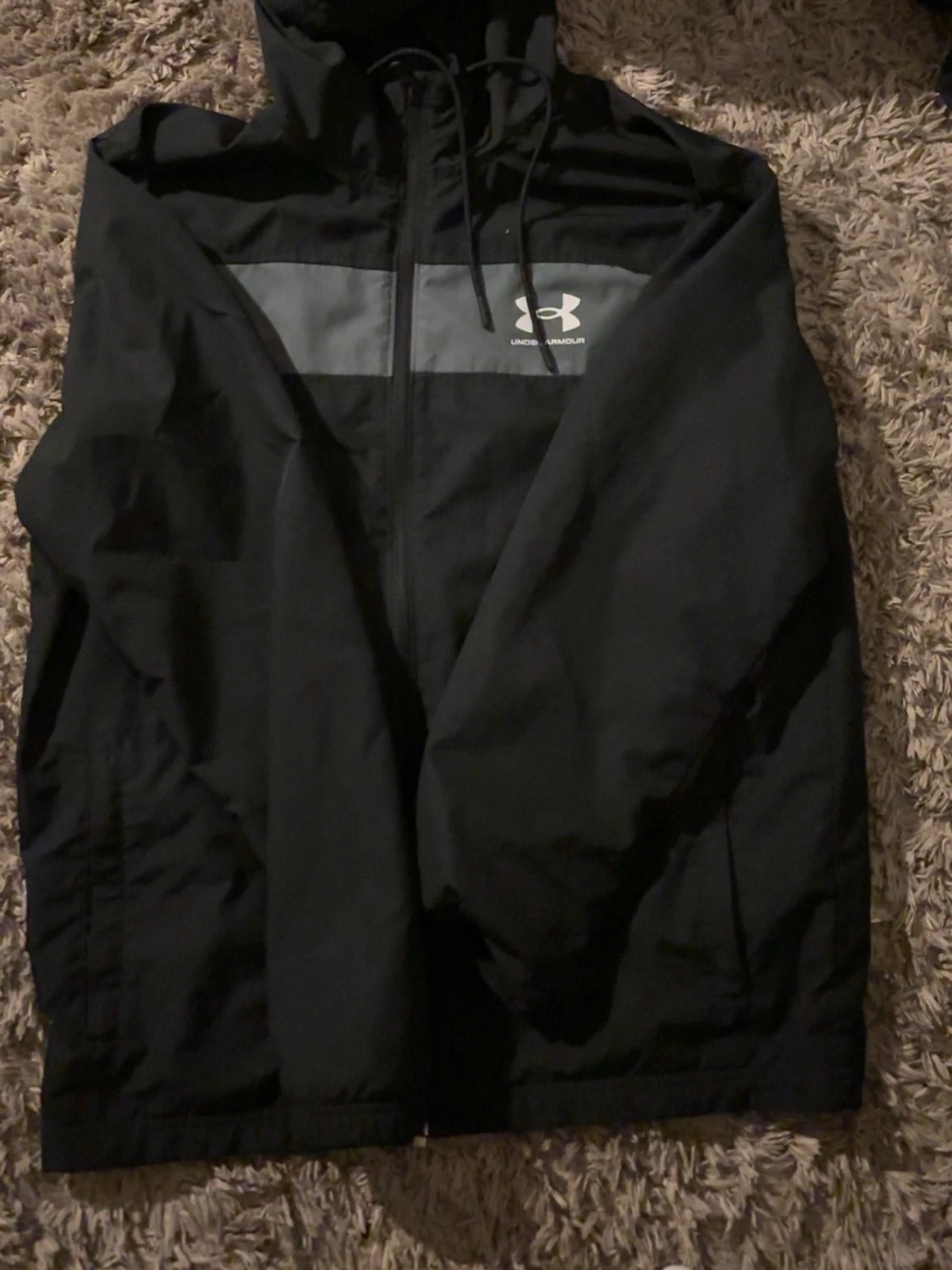 Svart vindjacka från Under Armour