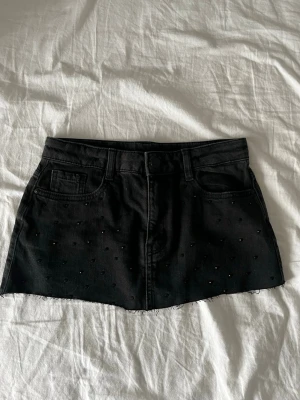 Jeanskjol - Kjol i barnstorlek men kan även användas som mini kjol i storlek xs till xxs 