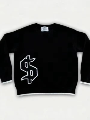 Svart stickad tröja med dollartecken - Cool svart stickad tröja från Drew House med ett stort vitt dollartecken på framsidan. Tröjan har rund hals, långa ärmar och vita detaljer vid ärmslut och nederkant. Perfekt för dig som gillar streetwear och vill sticka ut.