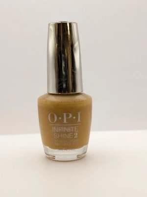 OPI Infinite Shine 2 Sun, Sea and Sand in My Pants gult nagellack 90% kvar - OPI Infinite Shine 2 nagellack i nyansen Sun, Sea and Sand in My Pants. Färgen är en varm gulbrun ton med krämig finish. Kommer i klassisk rund glasflaska med silverfärgat lock. Perfekt för dig som vill ha en unik och trendig färg på naglarna.