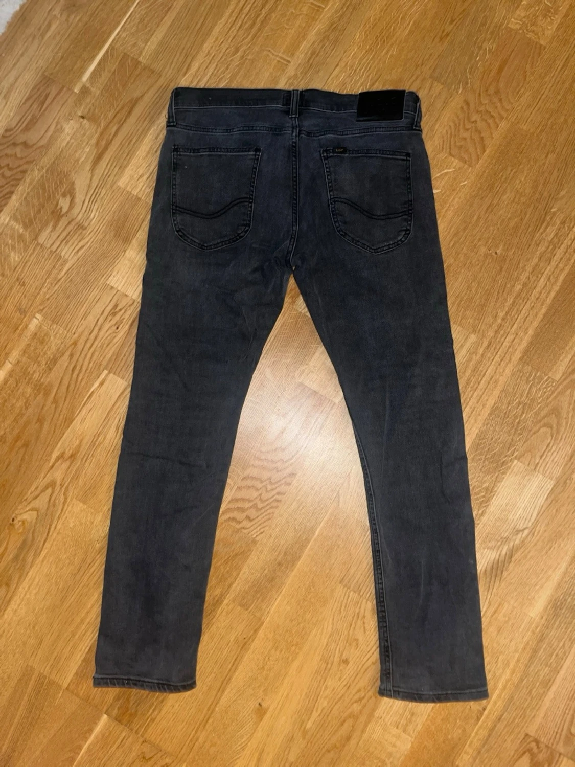 Svarta slim fit jeans från Lee W32 L30 - 1