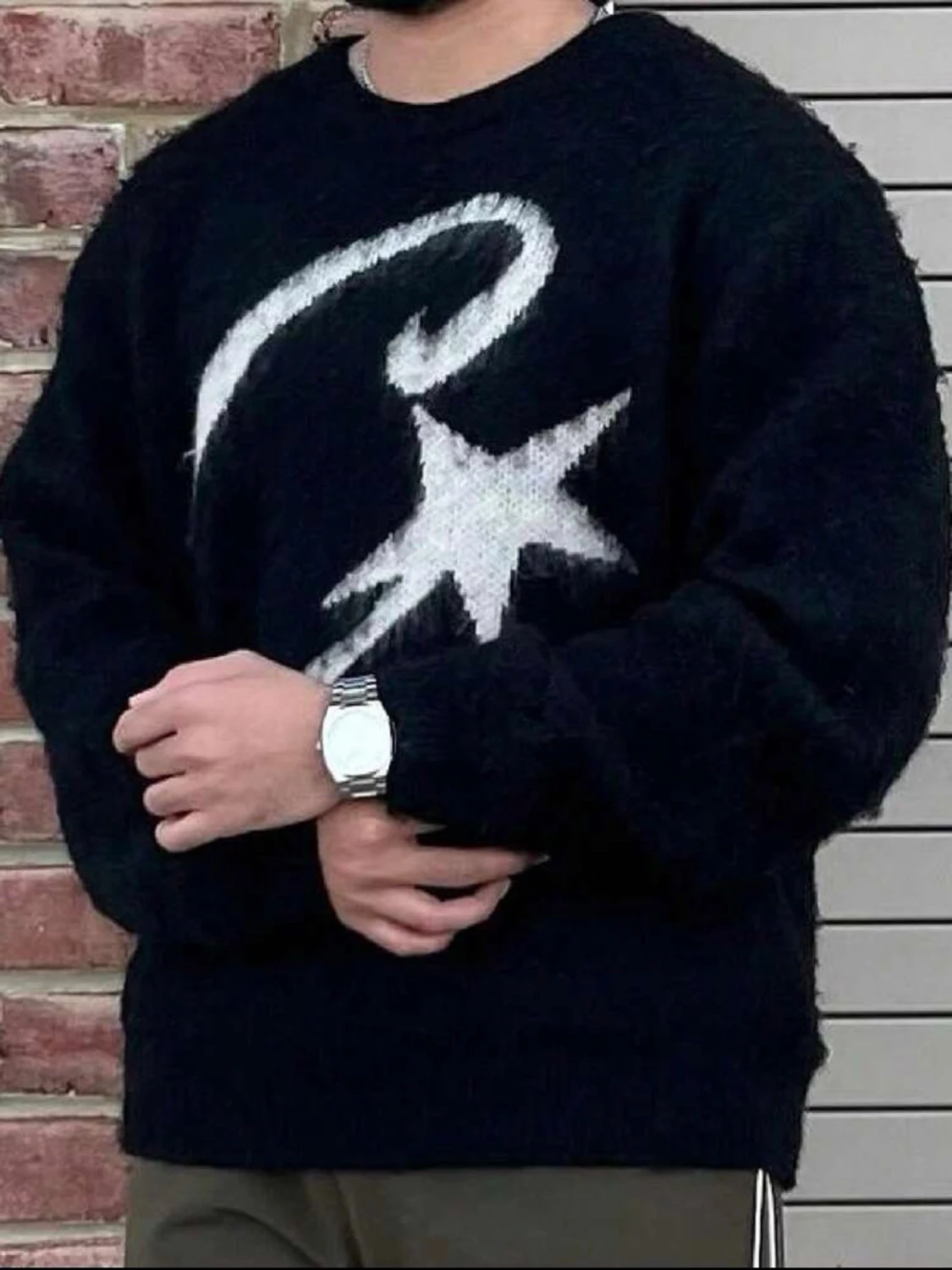 Svart stickad tröja med stjärntryck - 1