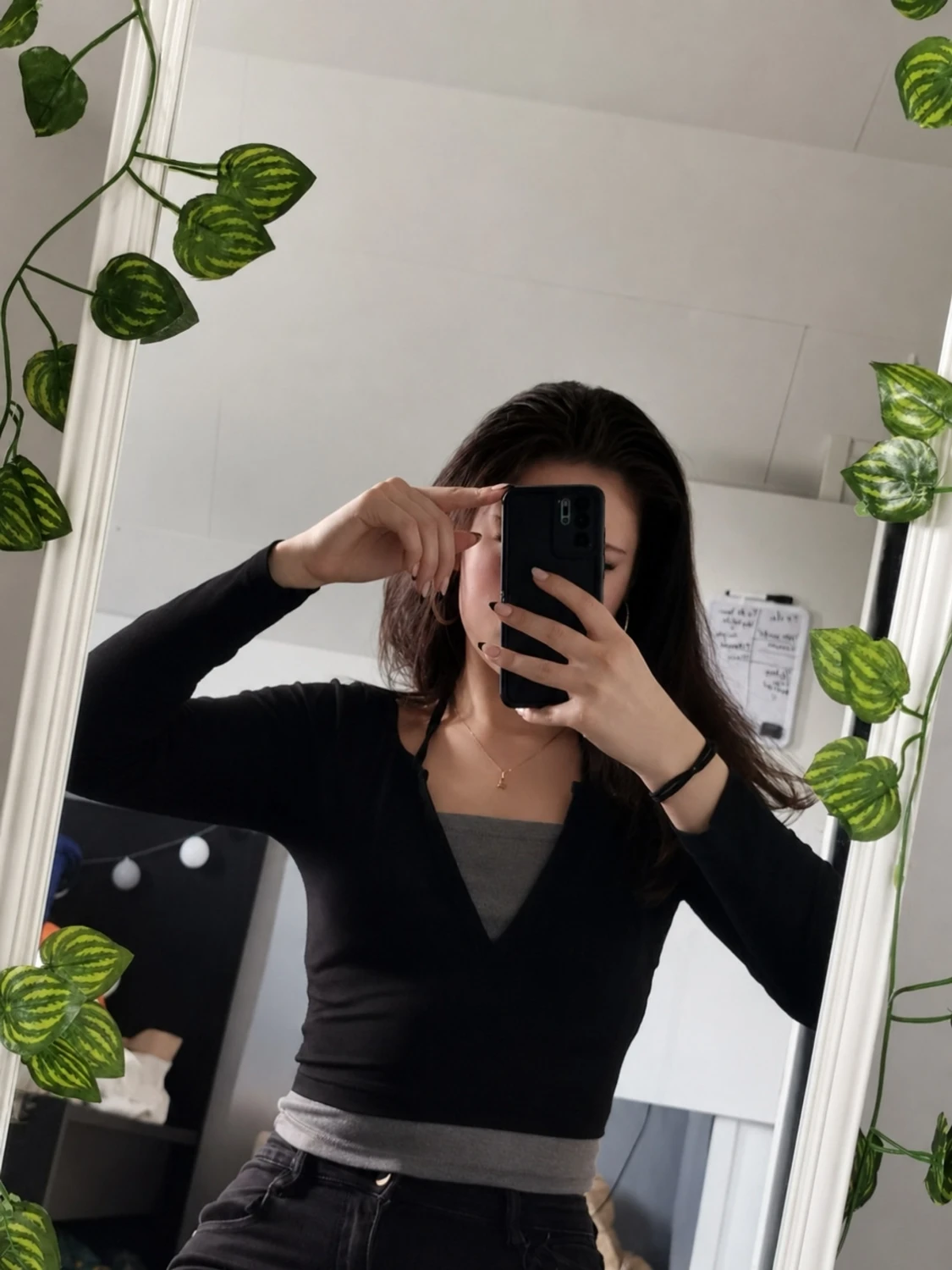Svart topp med knappar