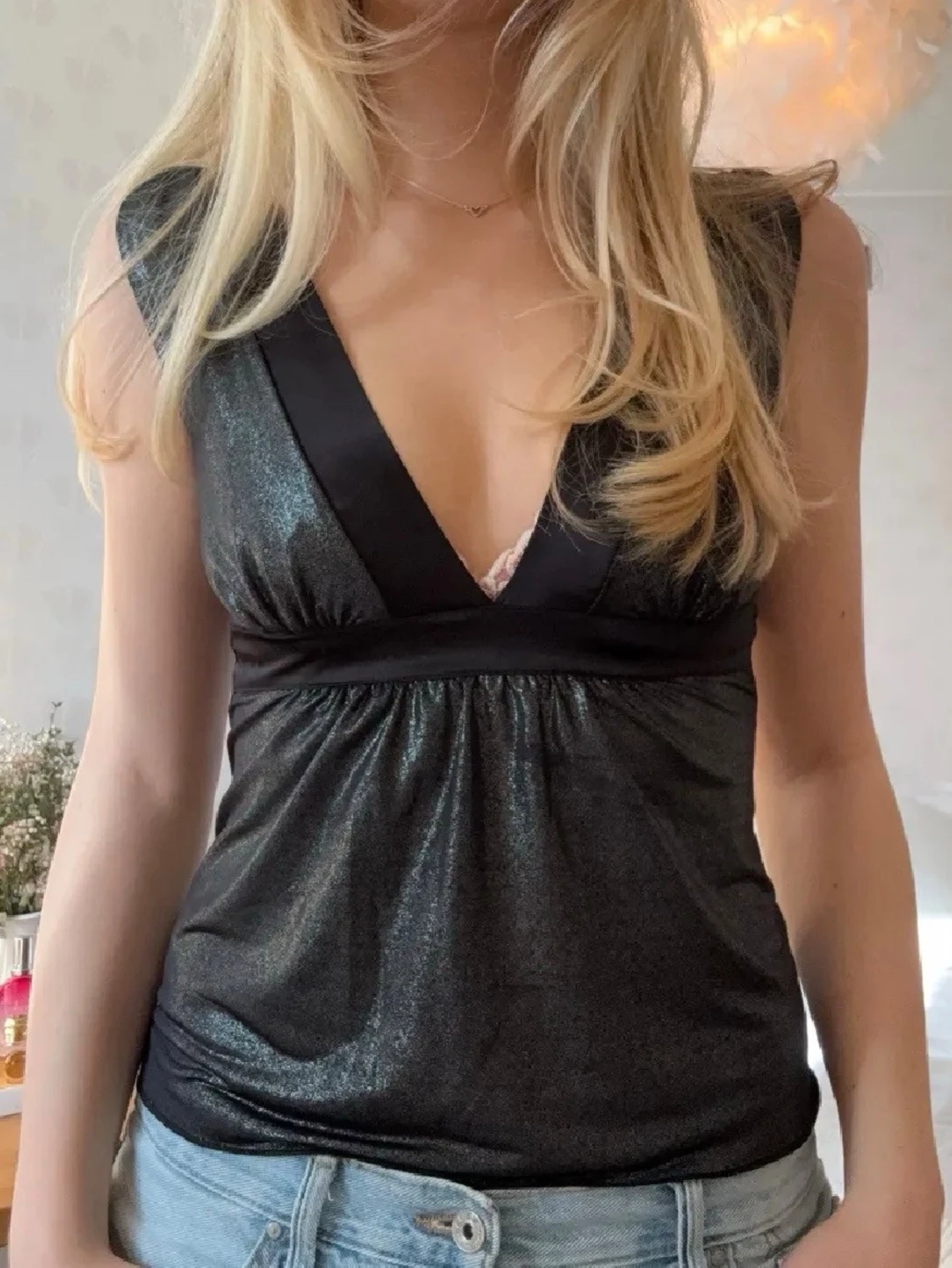 Glittrig svart linnetopp