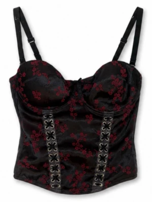 Svart Korsett med röda blommor | Storlek 80C - 💕 30% bundlerabatt vid köp av minst två artiklar 🌸 Svart Korsett med röda blommor.           ✔️Märke: Body Zone by KappAhl.                         📏Storlek 80C.                                                     ⭐️Fint använt skick. Hel och ren utan fläckar, hål eller andra synliga brister. Knäpps med hyskor i bak. Avtagbara axelband.