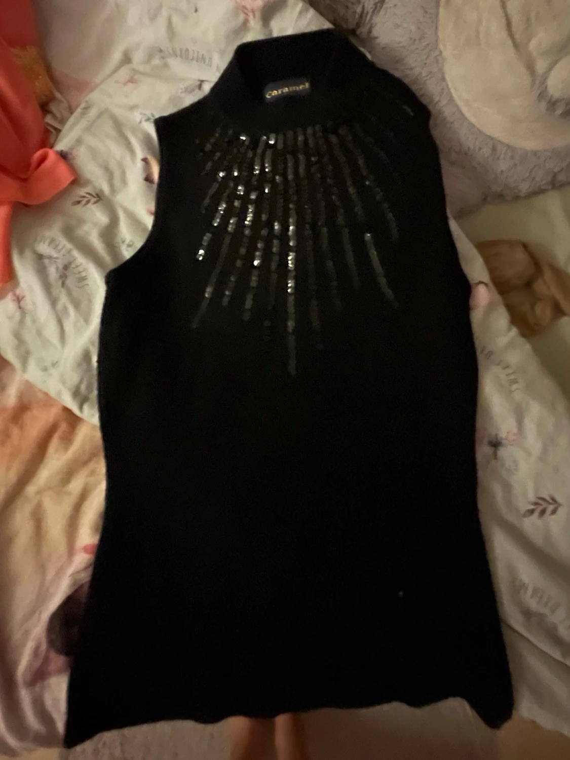 Svart ärmlös topp med paljetter